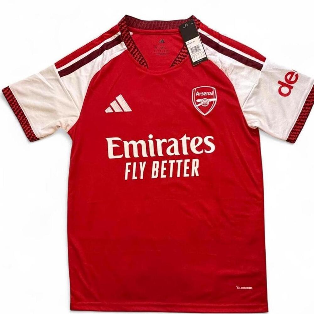 Adidas Arsenal 2026/27 home shirt in red with white sleeves and red stripes numb